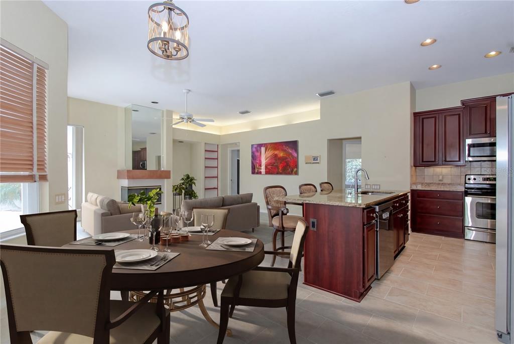 2319 Sunview Avenue Valrico, FL 33596 - Photo 20 of 41 a kitchen with a dining table and chairs