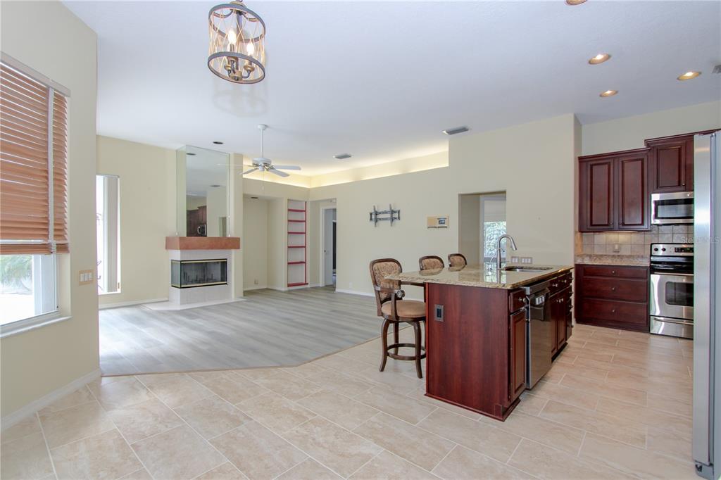 2319 Sunview Avenue Valrico, FL 33596 - Photo 21 of 41 a kitchen with a table and chairs