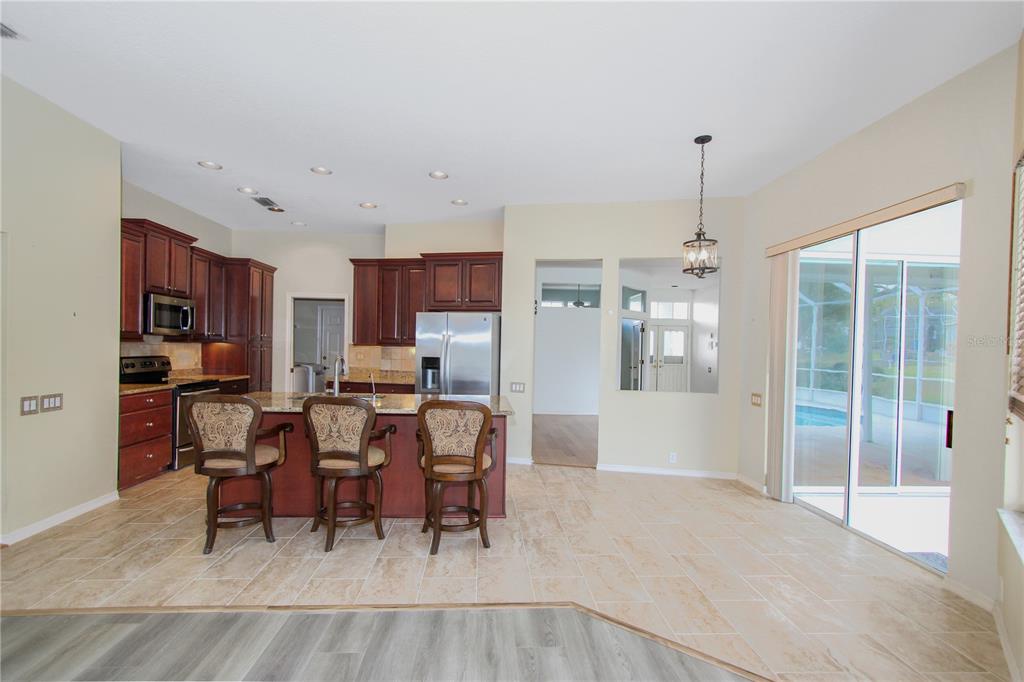 2319 Sunview Avenue Valrico, FL 33596 - Photo 24 of 41 a view of a dining room with furniture