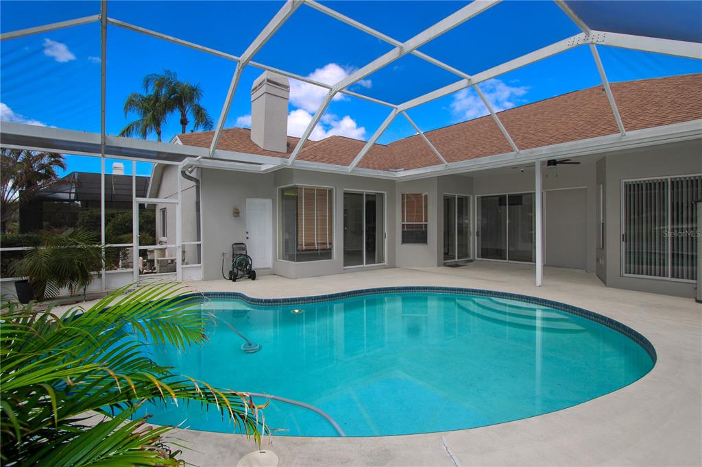 2319 Sunview Avenue Valrico, FL 33596 - Photo 36 of 41 a view of a house with pool and sitting area
