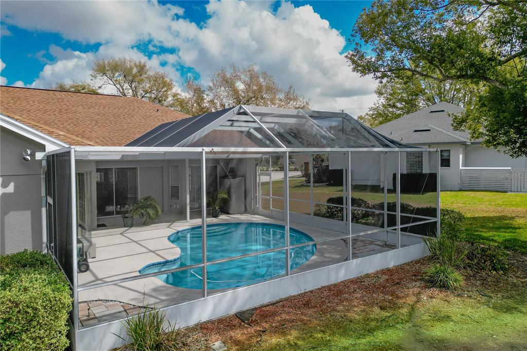 2319 Sunview Avenue Valrico, FL 33596 - Photo 37 of 41 a view of a house with backyard porch and sitting area