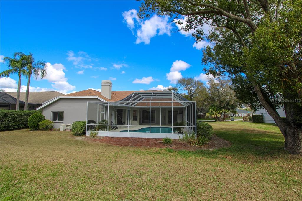 2319 Sunview Avenue Valrico, FL 33596 - Photo 39 of 41 a front view of a house with yard and green space