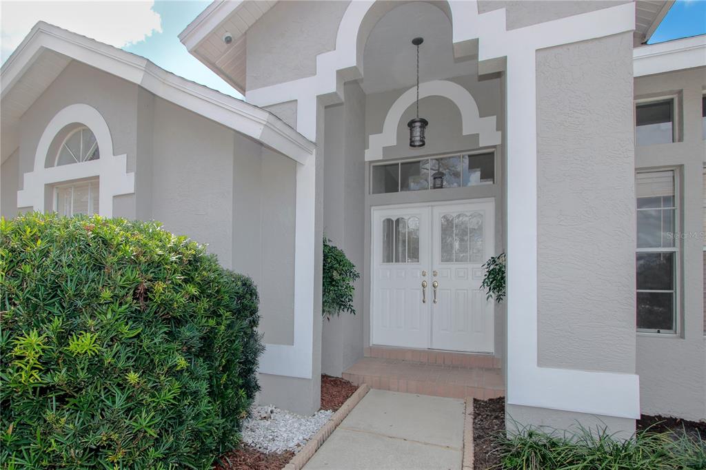 2319 Sunview Avenue Valrico, FL 33596 - Photo 6 of 41 a front view of a house with a garden