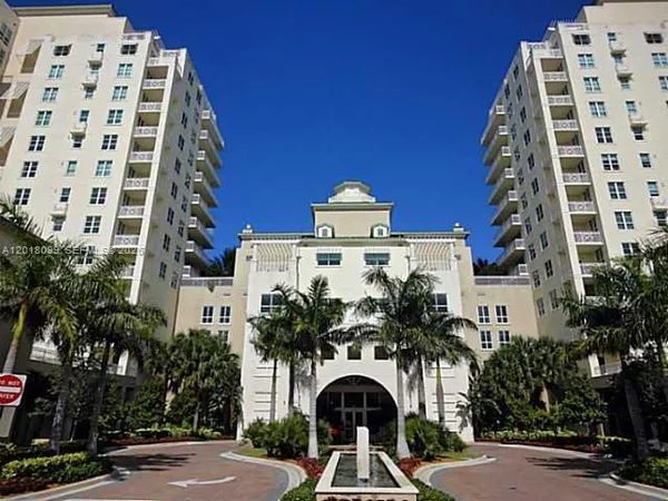 a view of a building with a street