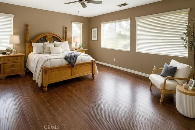 a bedroom with bed and a window