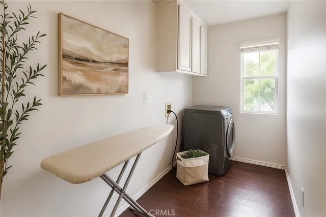a living room with a couch and a window