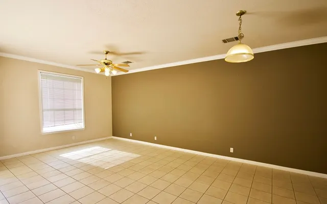 an empty room with windows