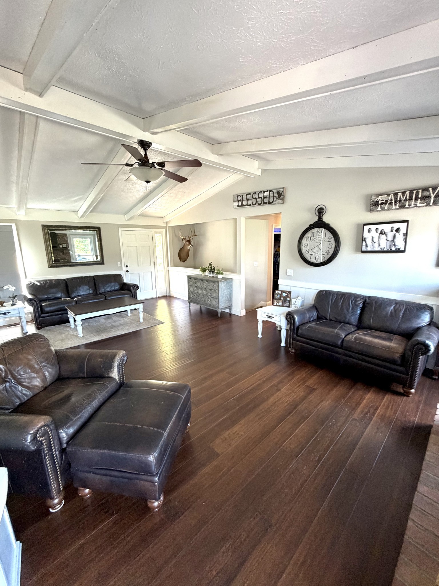 356 Lee Road Cottontown, TN 37048 - Photo 15 of 52 a living room with furniture and a wooden floor