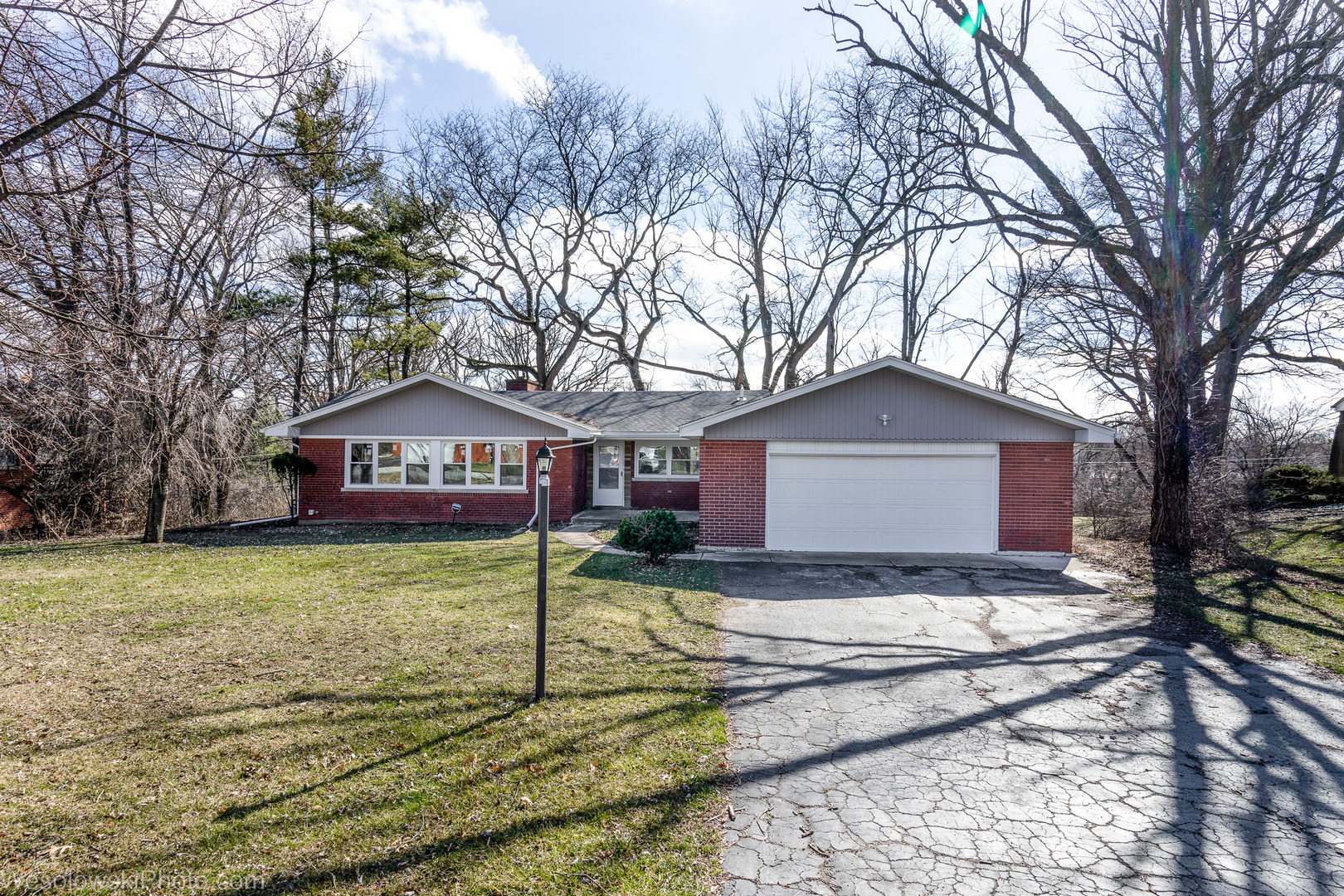 820 Exmoor Road Olympia Fields, IL 60461 - Photo 2 of 35 a house that has a tree in front of it
