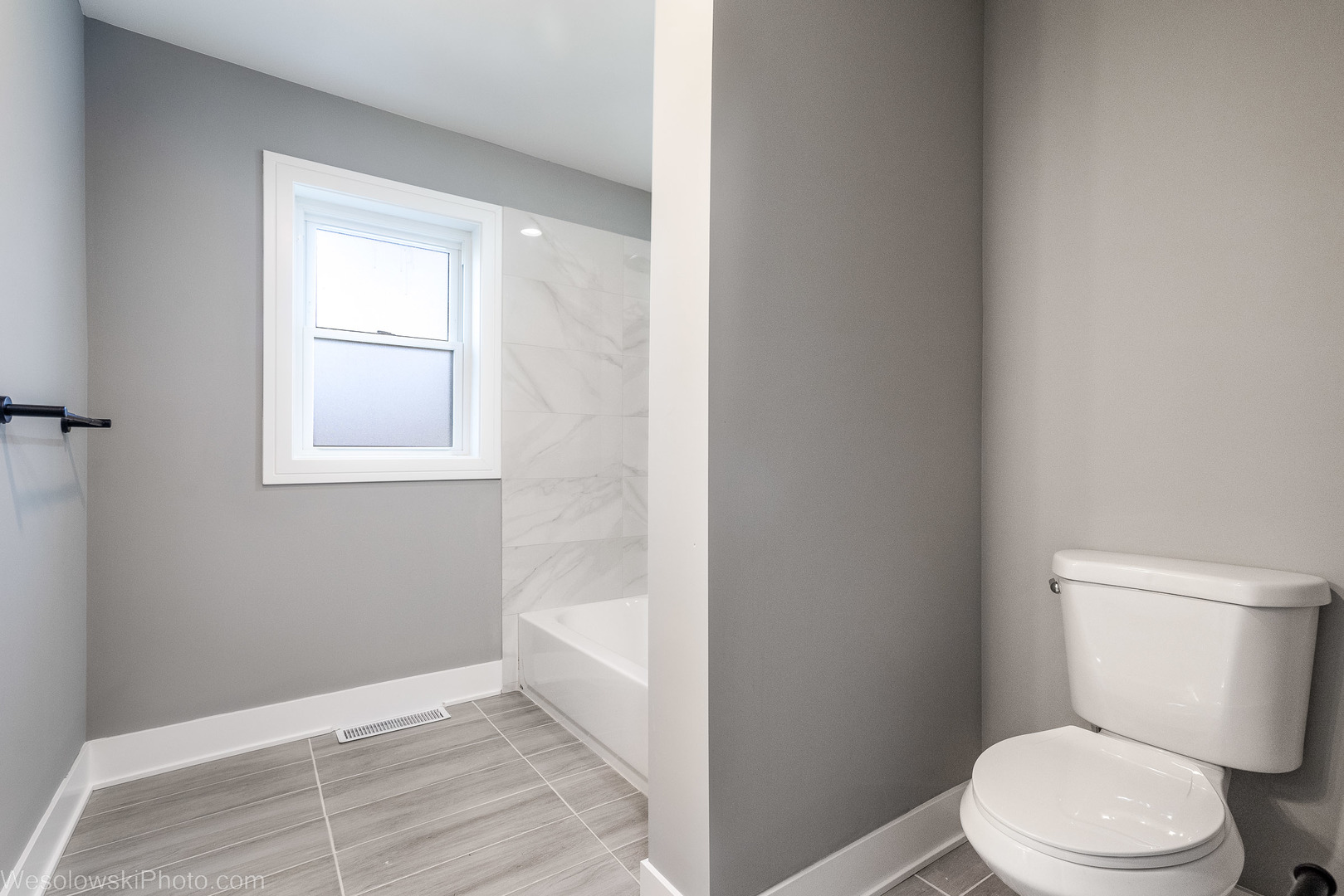 820 Exmoor Road Olympia Fields, IL 60461 - Photo 23 of 35 a white toilet sitting in a bathroom next to a window