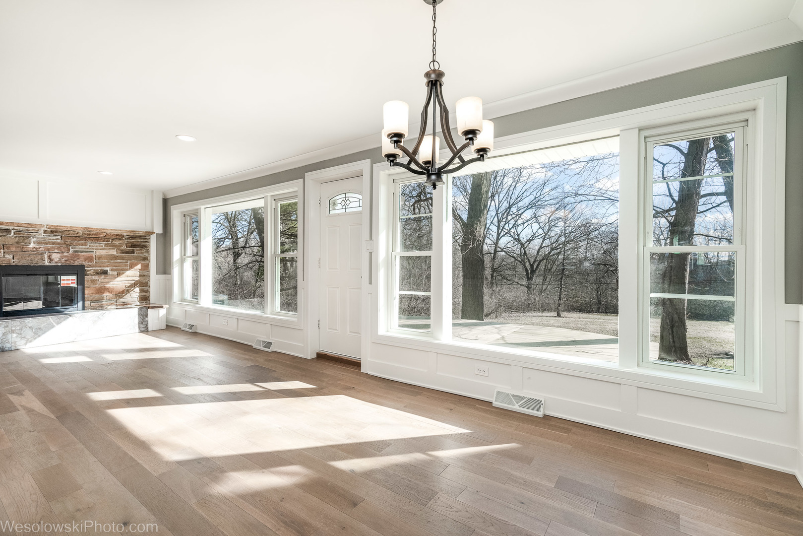 820 Exmoor Road Olympia Fields, IL 60461 - Photo 6 of 35 a view of a room with a large windows wooden floor and a chandelier