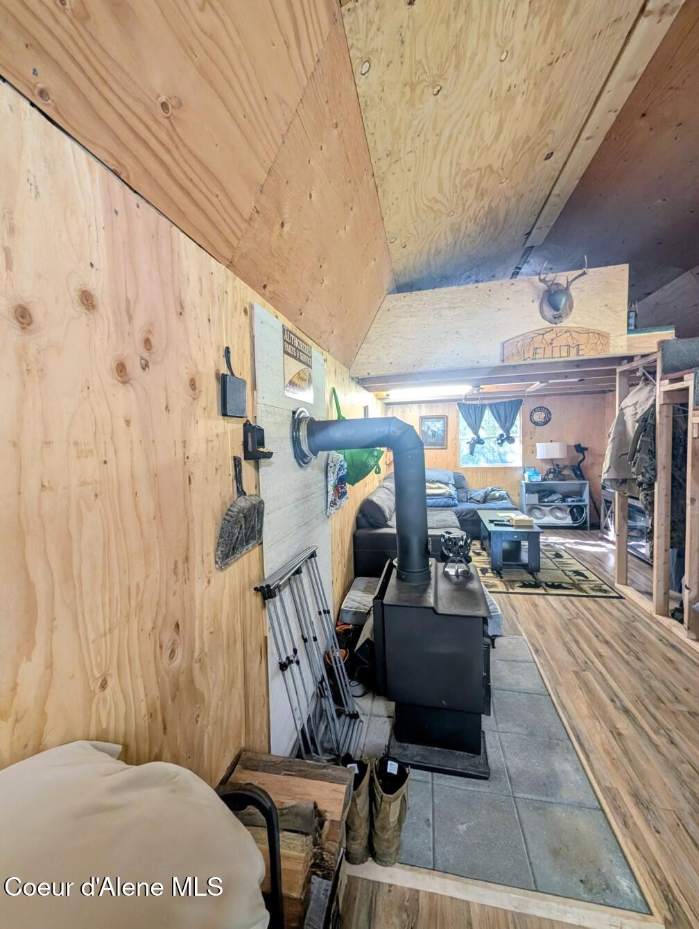 46 Acres Iron Horse Road Bonners Ferry, ID 83805 - Photo 15 of 46 Interior with wood stove