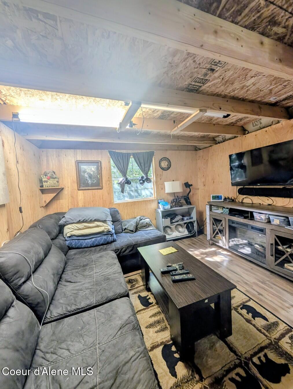 46 Acres Iron Horse Road Bonners Ferry, ID 83805 - Photo 18 of 46 Living room even with TV!