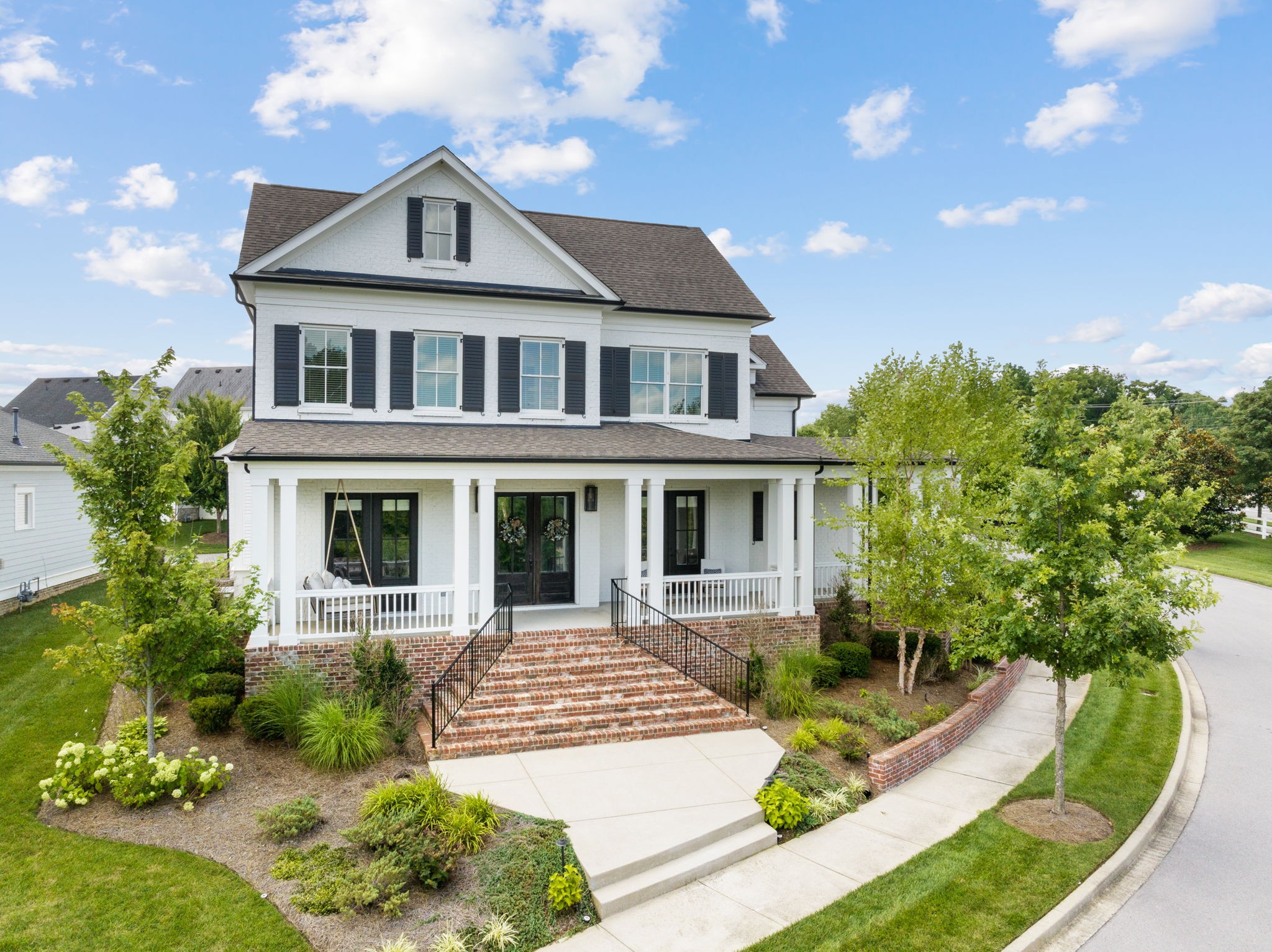 4048 General Martin Lane Franklin, TN 37064 - Photo 2 of 57 a front view of a house with a yard