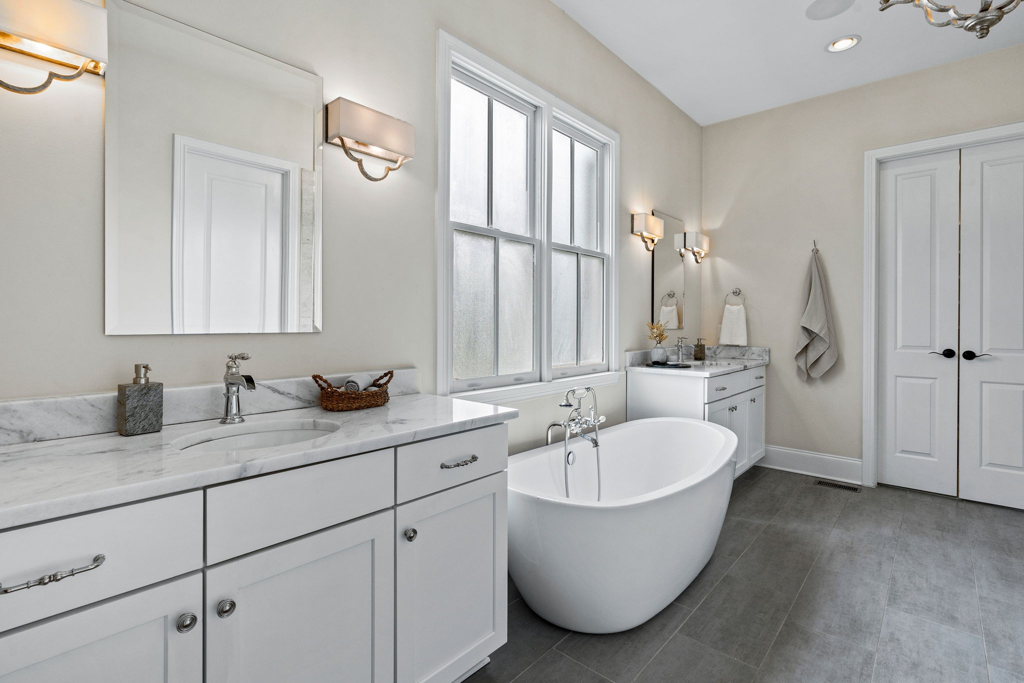 4048 General Martin Lane Franklin, TN 37064 - Photo 22 of 57 a bathroom with a granite countertop sink and a mirror