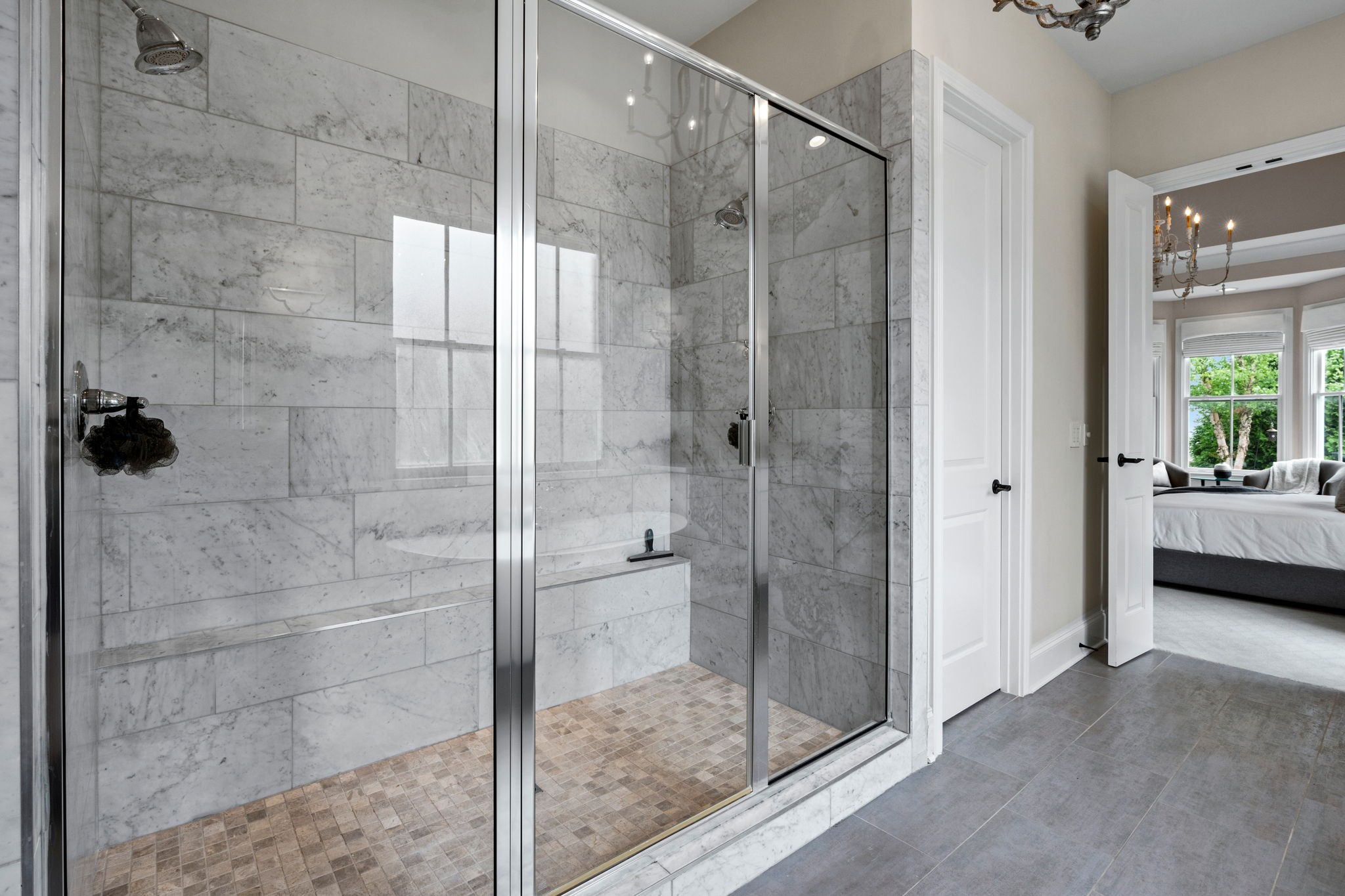 4048 General Martin Lane Franklin, TN 37064 - Photo 25 of 57 a bathroom with a glass shower door and a sink