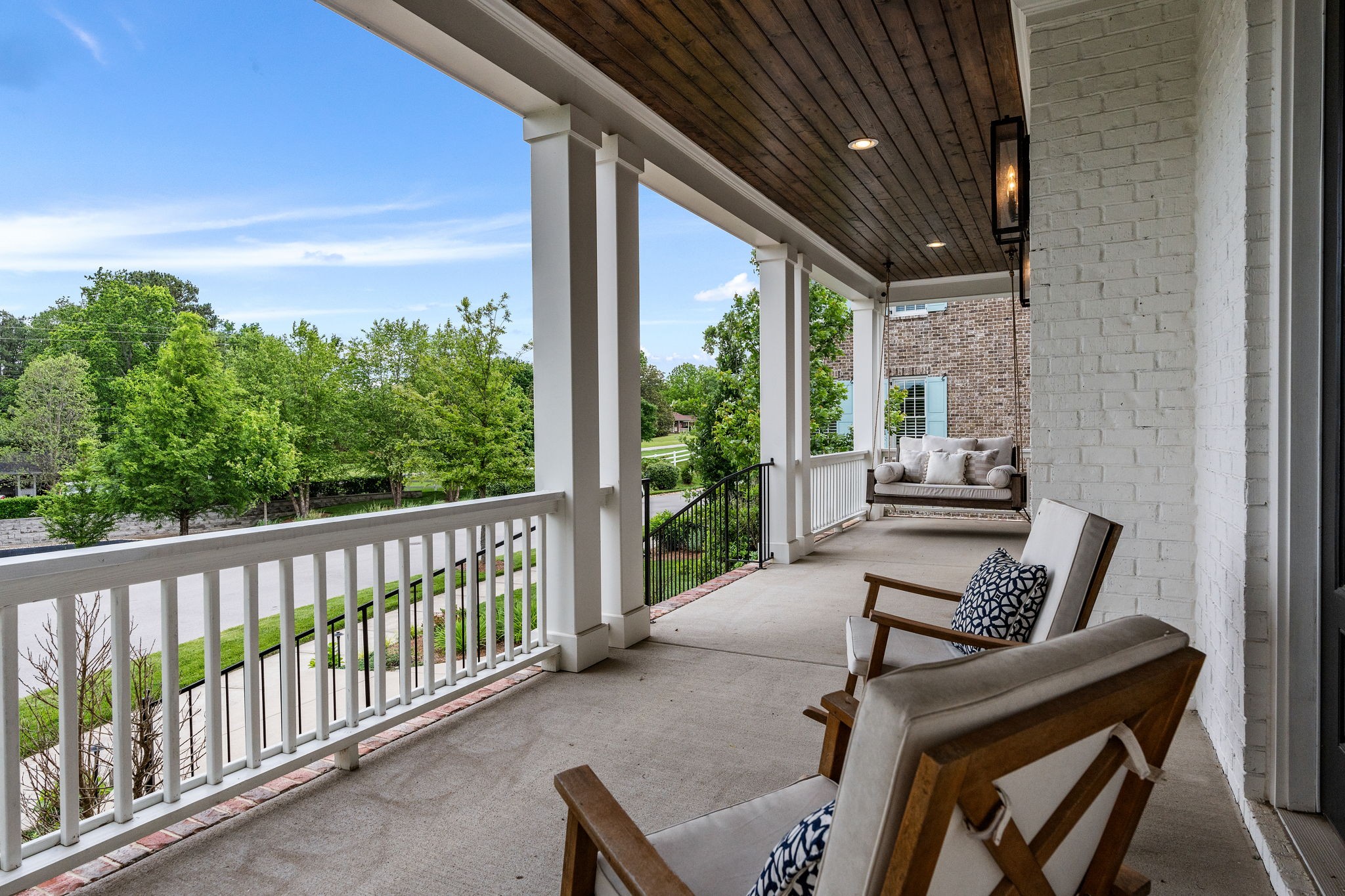 4048 General Martin Lane Franklin, TN 37064 - Photo 4 of 57 a view of balcony with wooden floor and outdoor seating