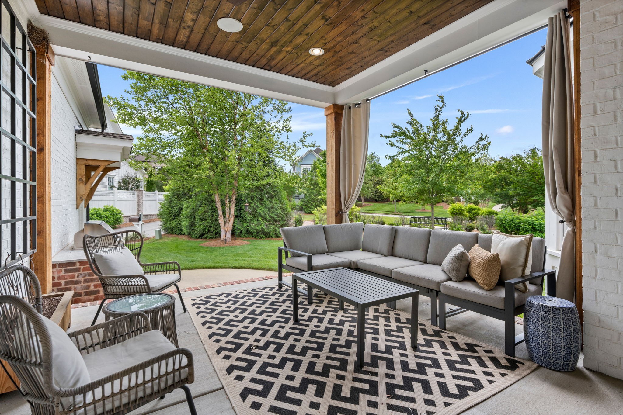 4048 General Martin Lane Franklin, TN 37064 - Photo 42 of 57 a outdoor living space with patio furniture and a garden
