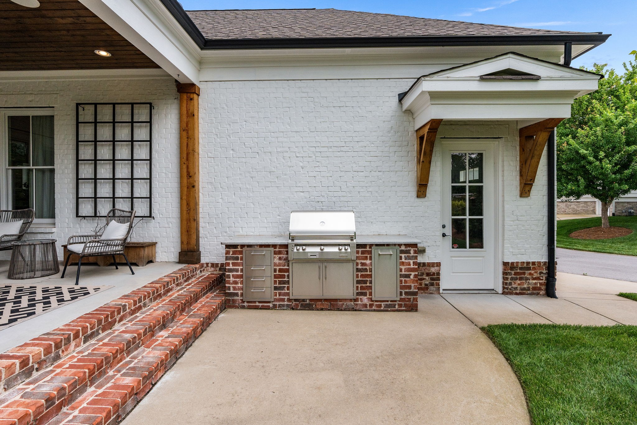 4048 General Martin Lane Franklin, TN 37064 - Photo 44 of 57 a front view of a house with barbeque outdoor area
