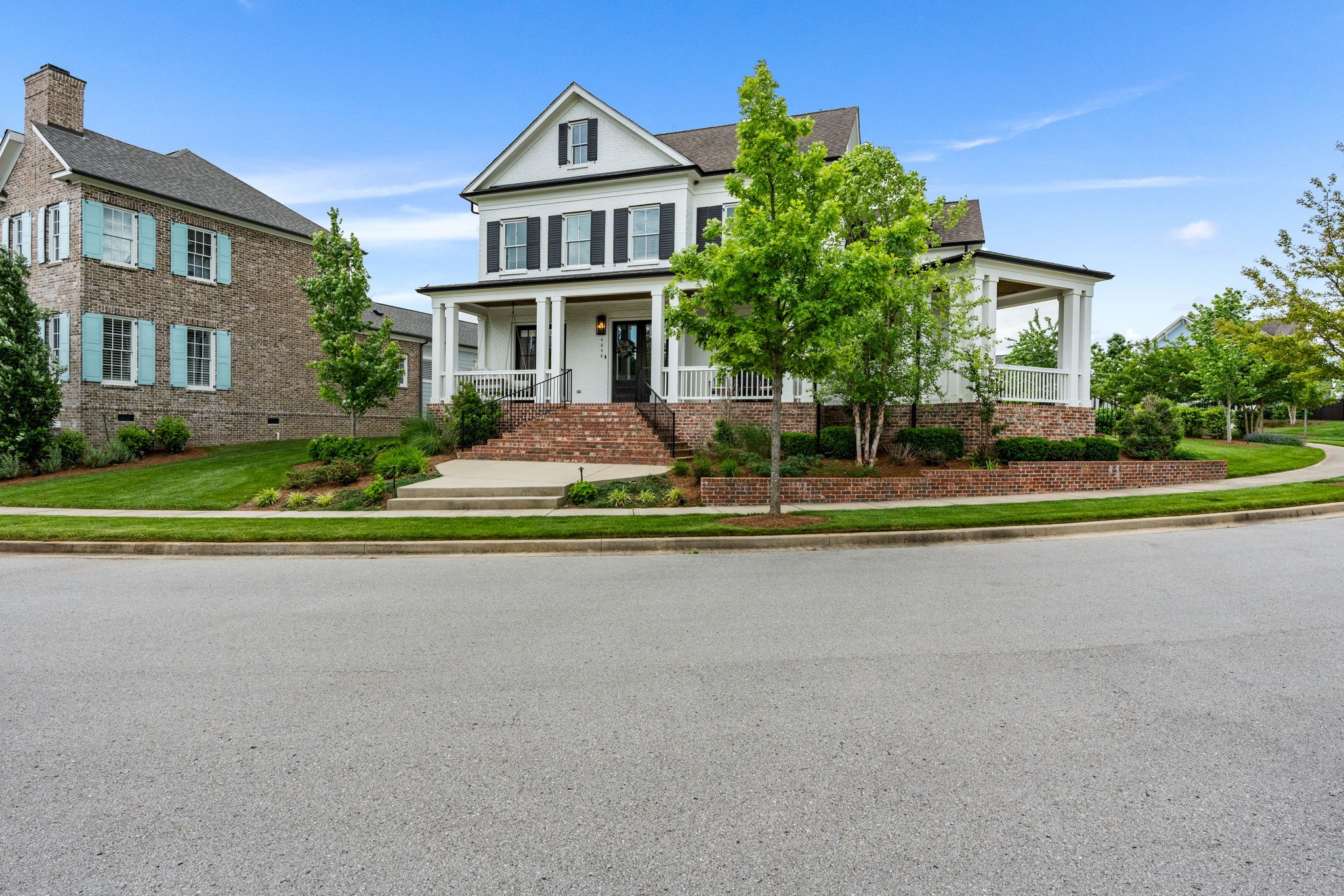 4048 General Martin Lane Franklin, TN 37064 - Photo 46 of 57 a front view of a house with a yard