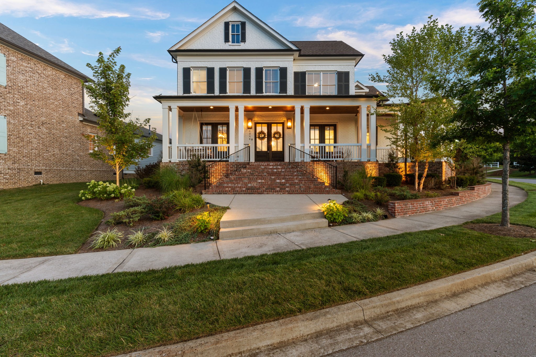 4048 General Martin Lane Franklin, TN 37064 - Photo 51 of 57 a front view of a house with garden and porch