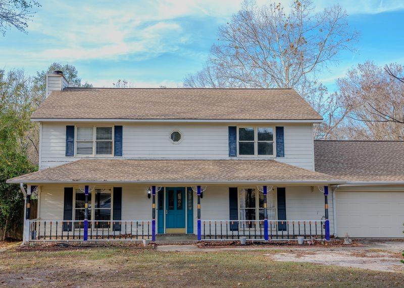 a front view of a house with a porch