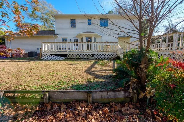a front view of a house with a lake view