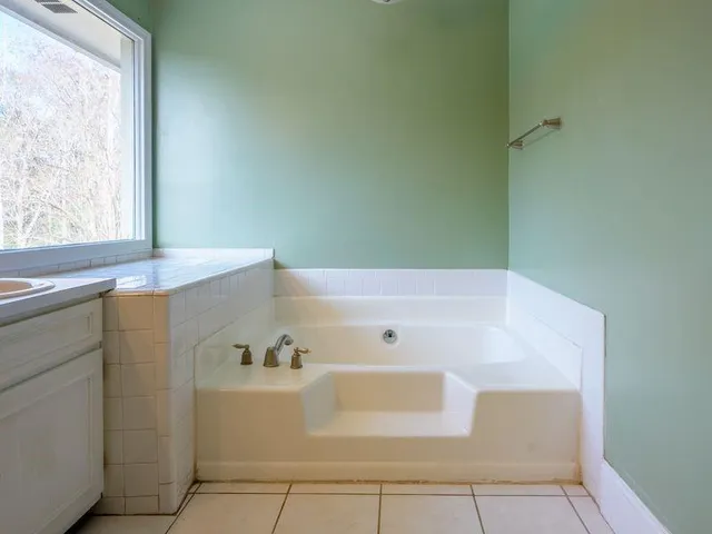 a bathroom with a bathtub