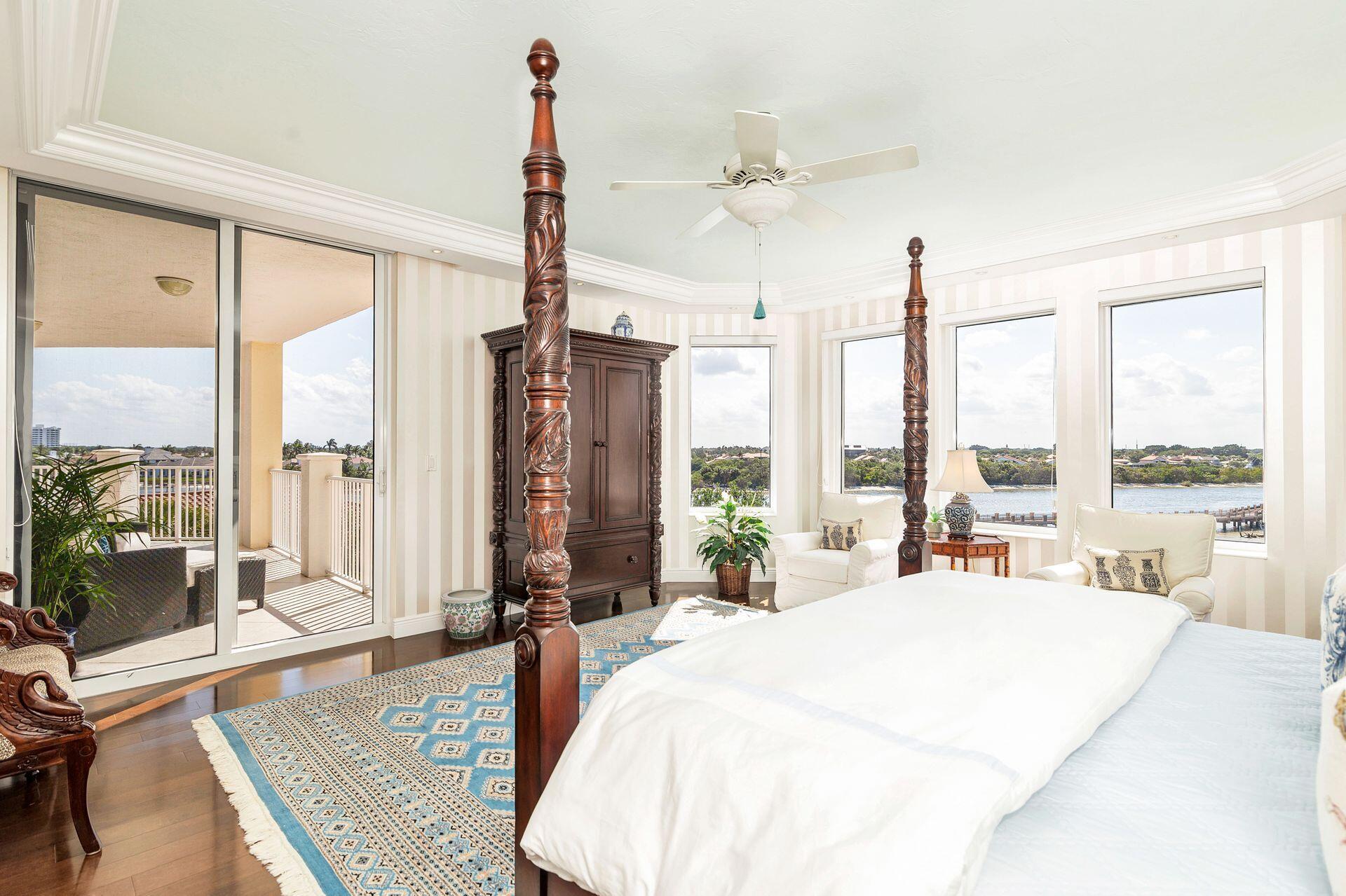 700 Highway 1, Unit 401 Jupiter, FL 33477 - Photo 25 of 39 a spacious bedroom with a large window and a table