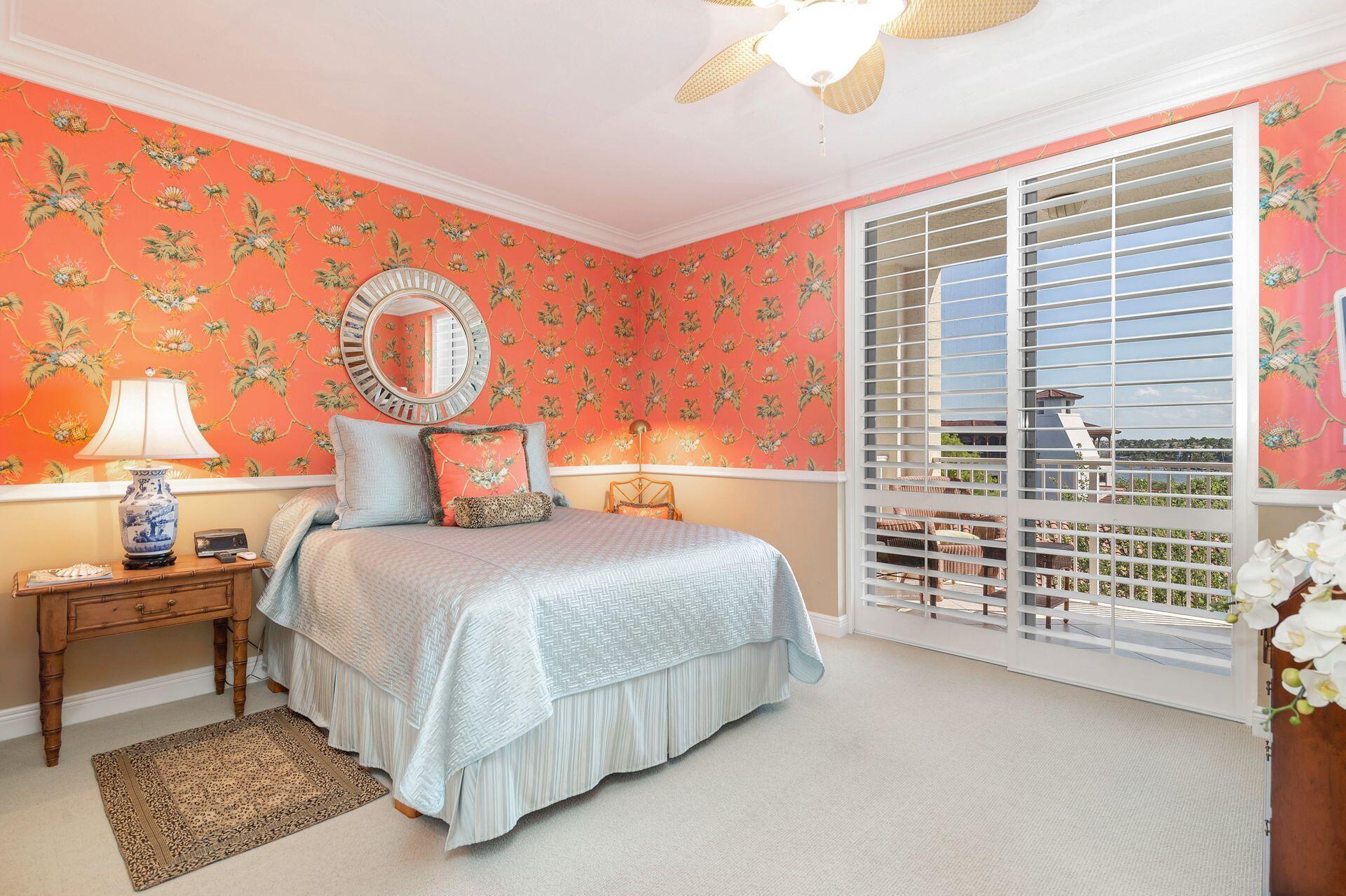 700 Highway 1, Unit 401 Jupiter, FL 33477 - Photo 30 of 39 a bedroom with a bed and a window