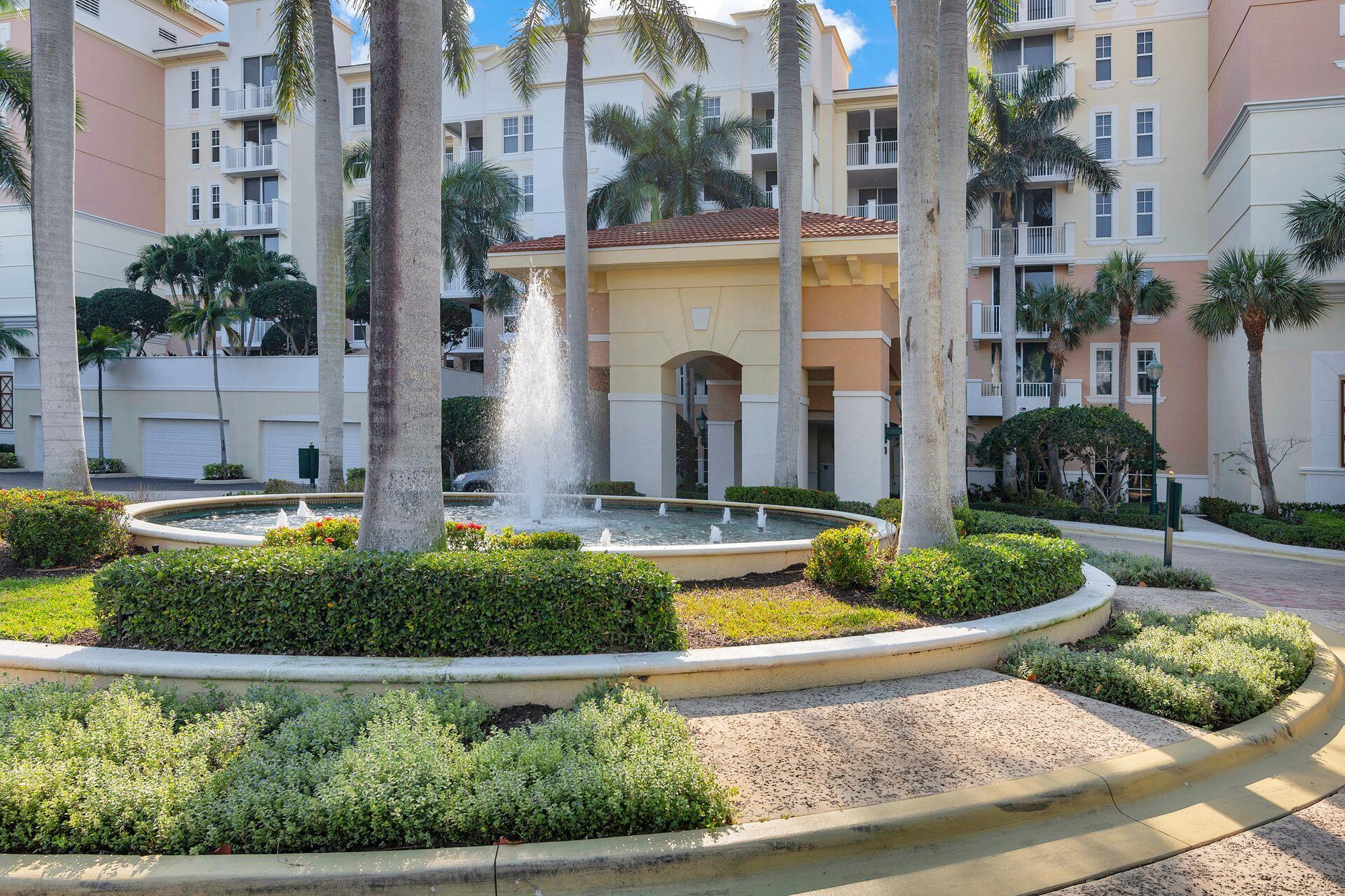700 Highway 1, Unit 401 Jupiter, FL 33477 - Photo 3 of 39 a front view of a house with swimming pool