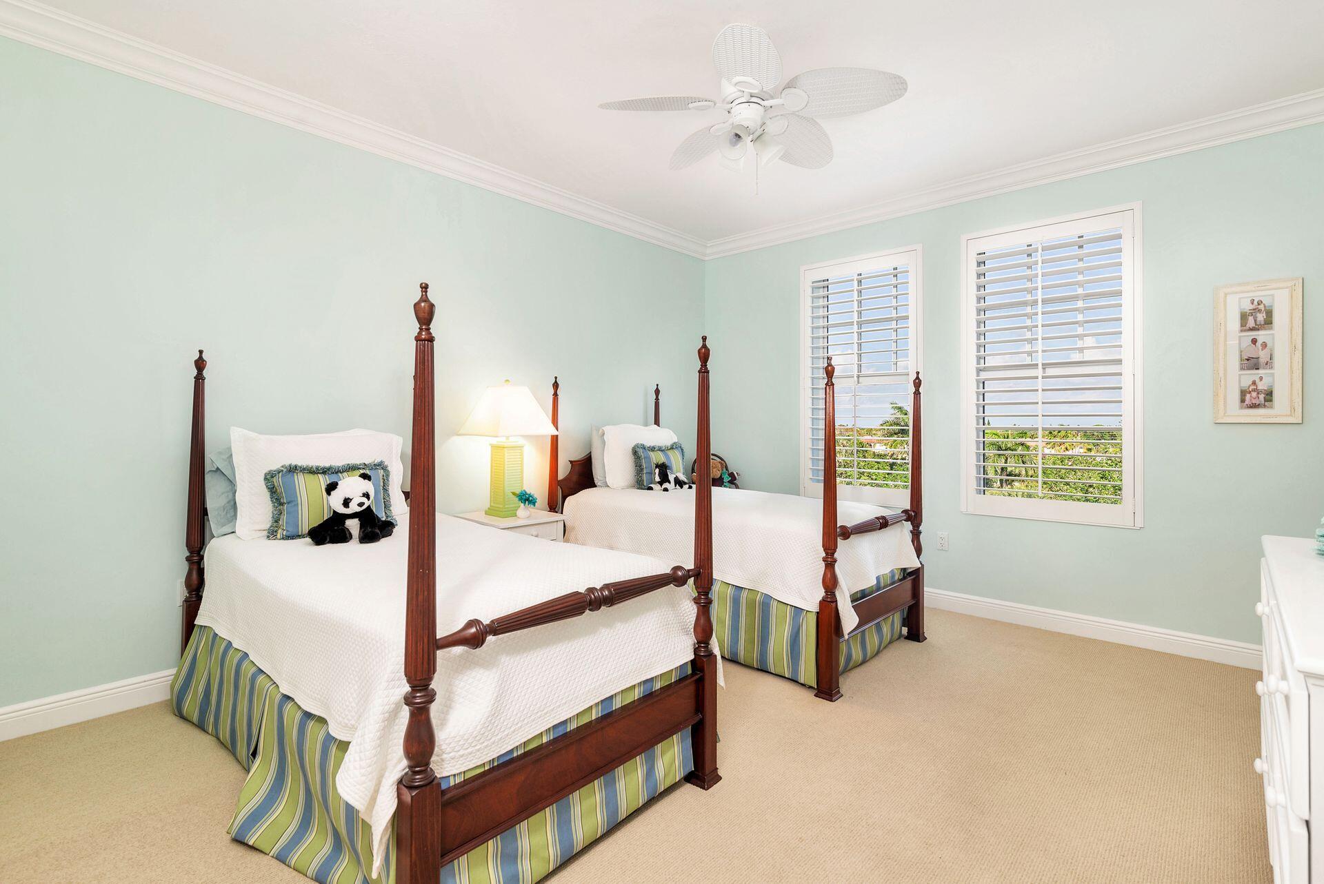 700 Highway 1, Unit 401 Jupiter, FL 33477 - Photo 32 of 39 a bed room with a bed and a window