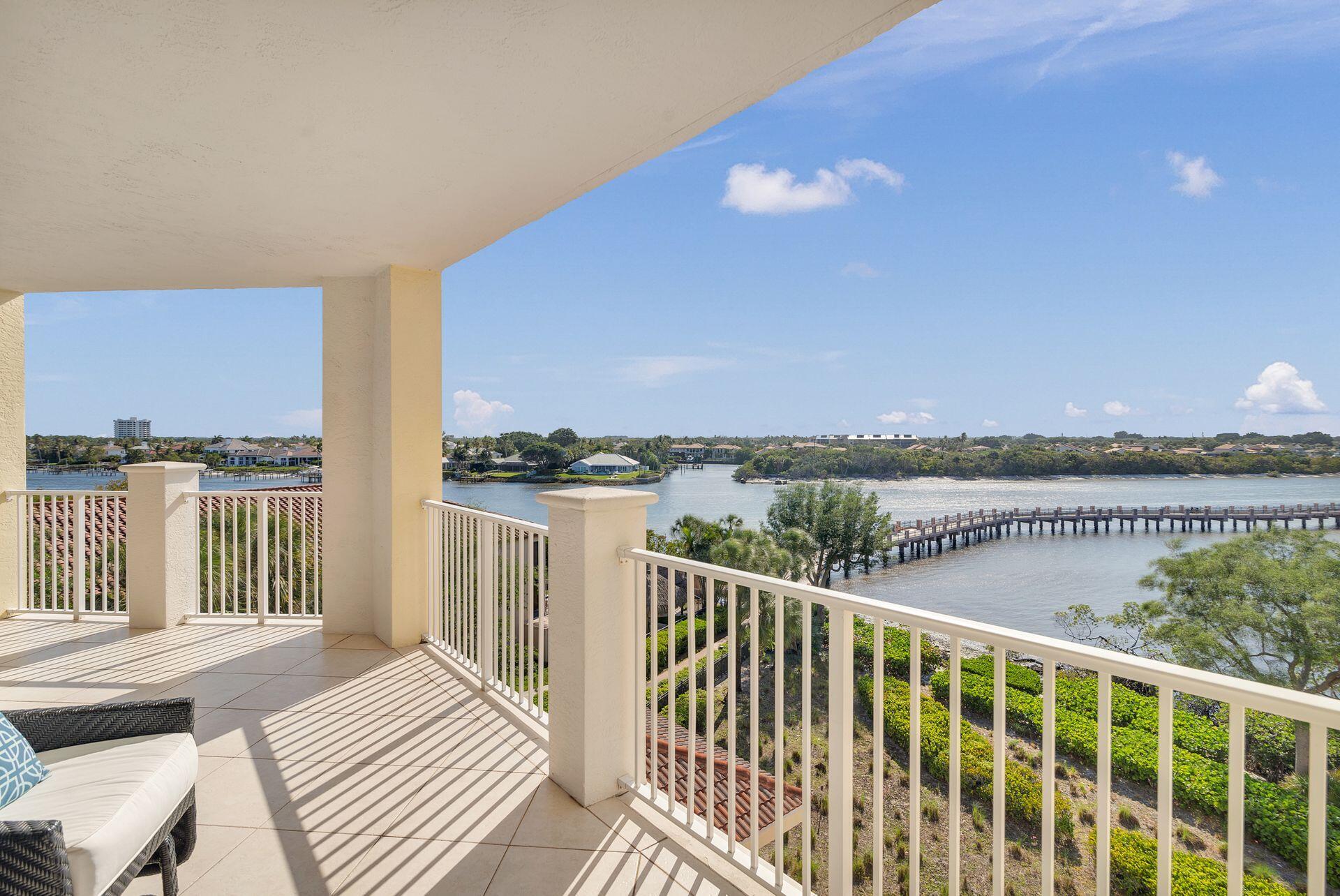 700 Highway 1, Unit 401 Jupiter, FL 33477 - Photo 6 of 39 a view of a balcony with wooden floor and outdoor space
