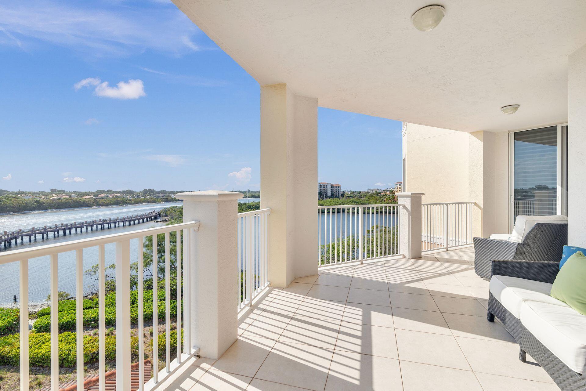 700 Highway 1, Unit 401 Jupiter, FL 33477 - Photo 7 of 39 a bedroom with furniture and a large window