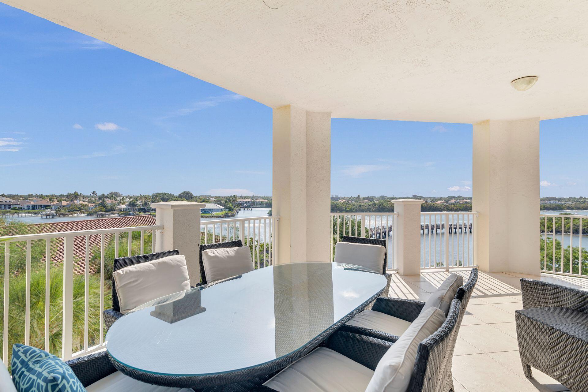 700 Highway 1, Unit 401 Jupiter, FL 33477 - Photo 8 of 39 a living room with furniture and a large window