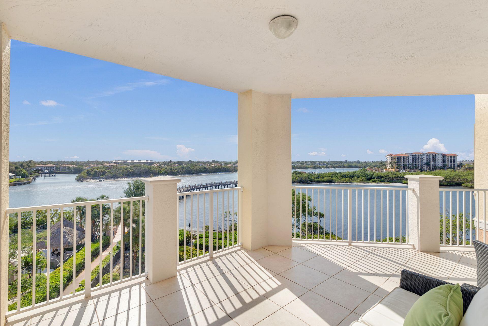 700 Highway 1, Unit 401 Jupiter, FL 33477 - Photo 9 of 39 a balcony with wooden floor