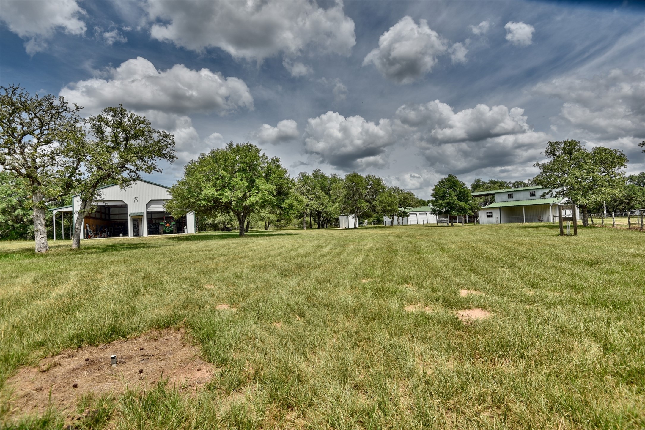 2003 Oak Ridge Road Weimar, TX 78962 - Photo 20 of 35 a front view of house with yard