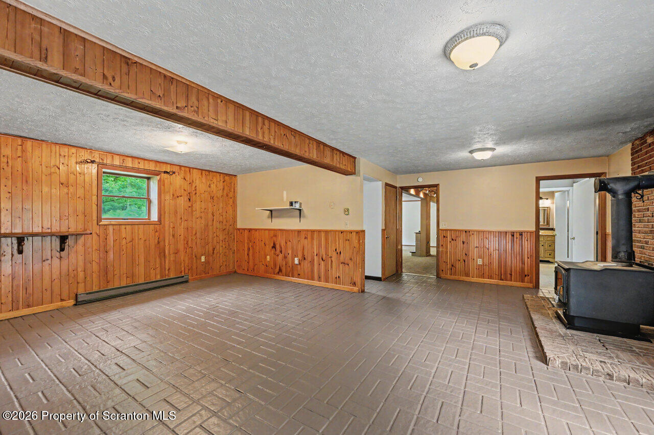 211 Buckingham Street Moscow, PA 18444 - Photo 55 of 83 a view of a livingroom with an empty space and a window