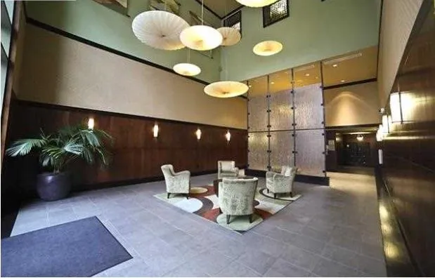 a kitchen with a table and chairs