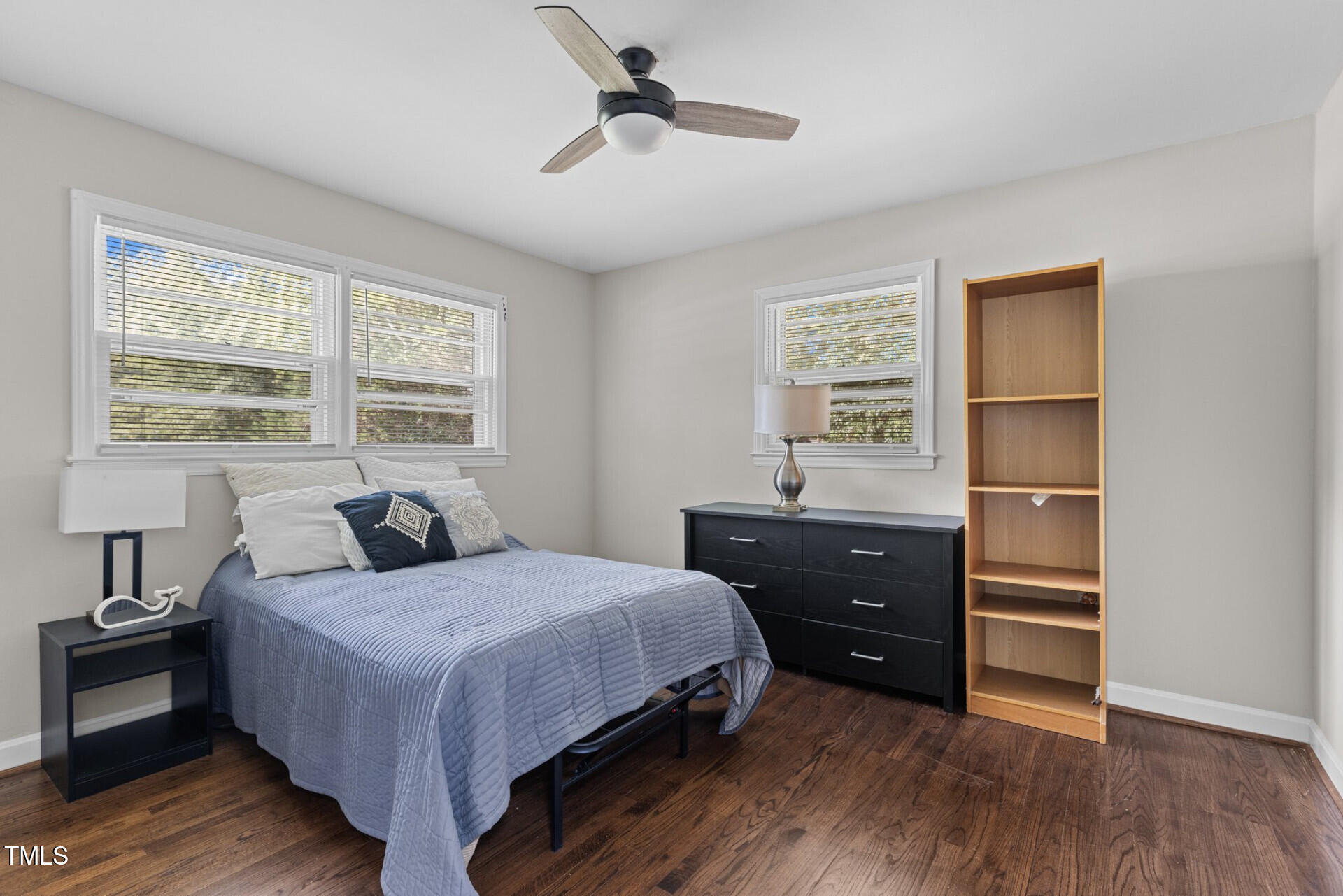 4828 Stafford Drive Durham, NC 27705 - Photo 11 of 22 a bedroom with a bed and a window