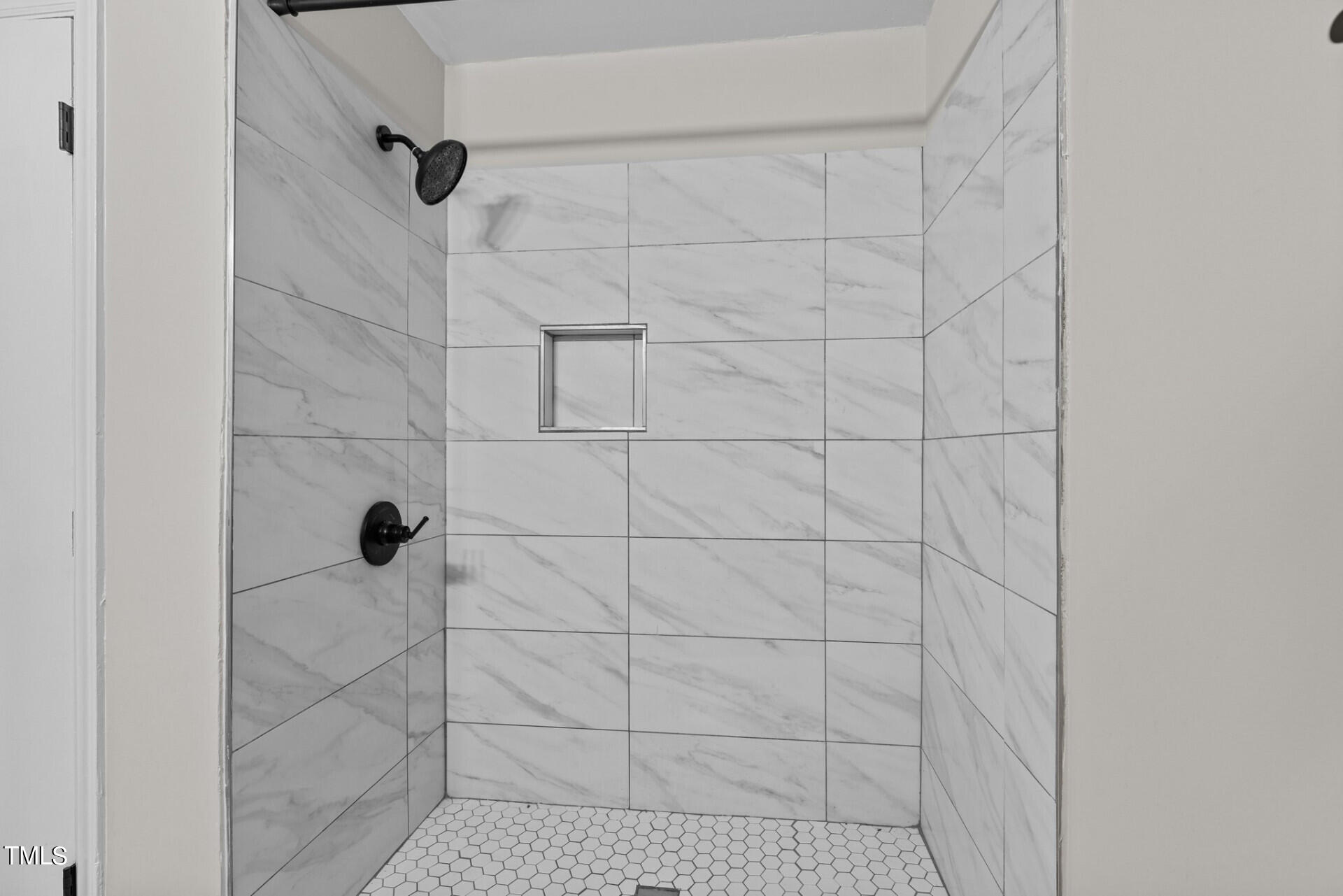 4828 Stafford Drive Durham, NC 27705 - Photo 15 of 22 a bathroom with a shower