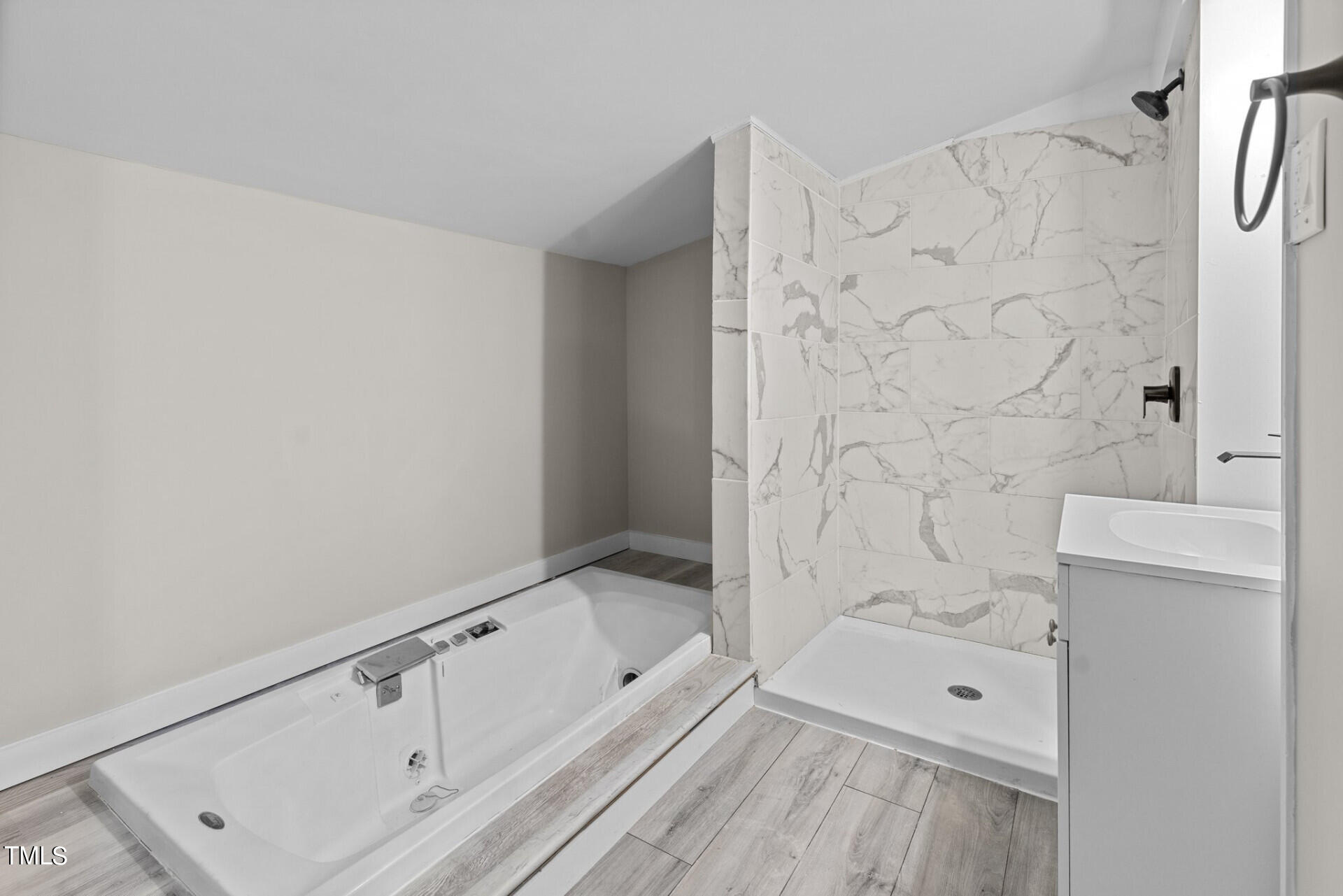 4828 Stafford Drive Durham, NC 27705 - Photo 9 of 22 a bathroom with a shower and a sink