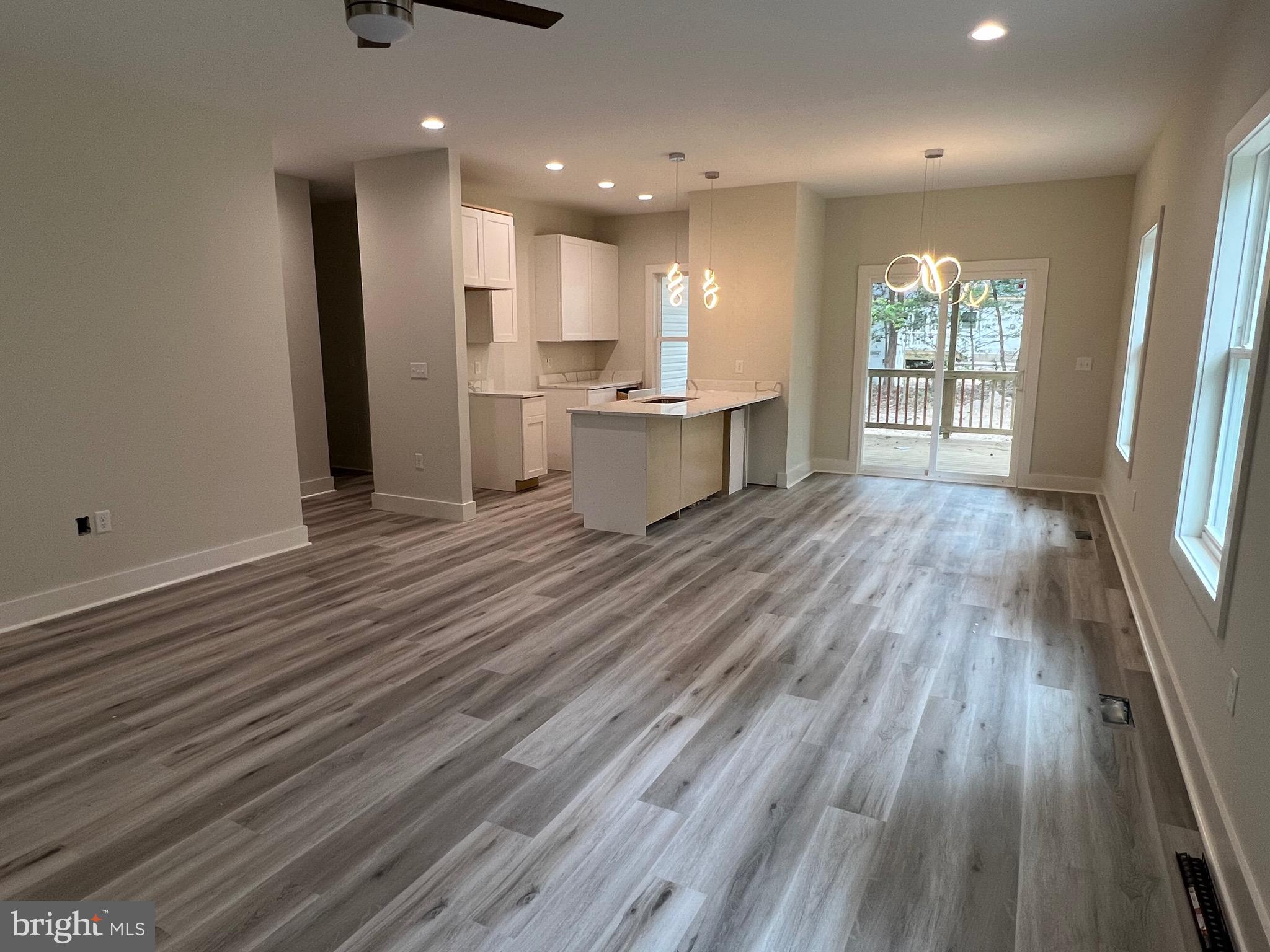 175 Rose Way Colonial Beach, VA 22443 - Photo 2 of 33 a view of kitchen and kitchen with wooden floor