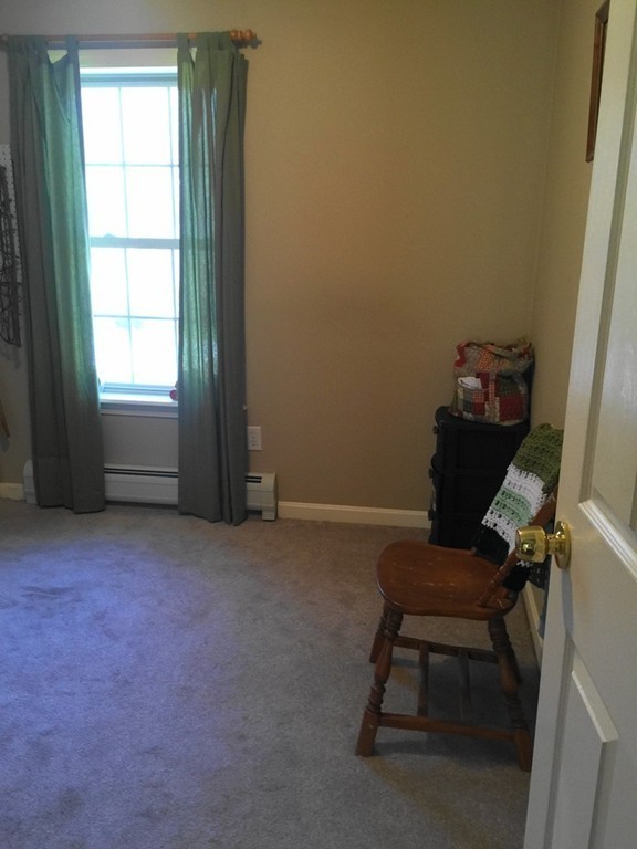 128 Brandy Hill Road Thompson, CT 06277 - Photo 17 of 26 a workspace with furniture and a window