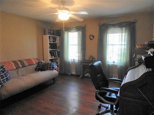128 Brandy Hill Road Thompson, CT 06277 - Photo 10 of 26 a living room with furniture and a window