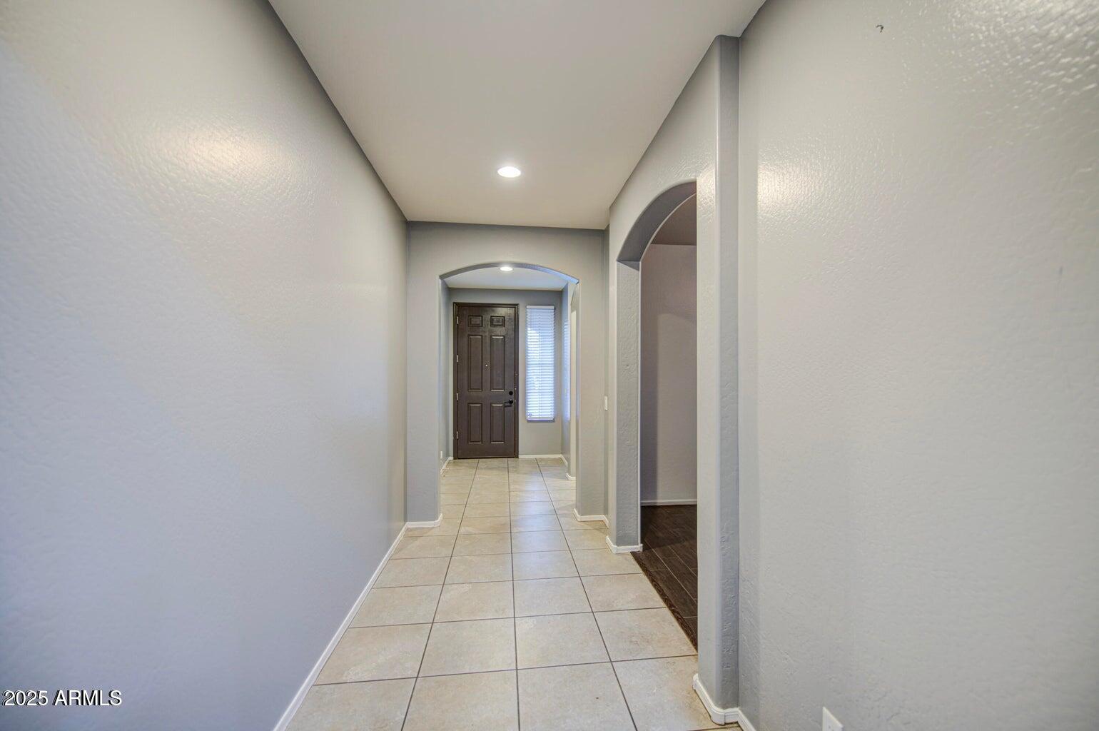 6815 South 19th Lane Phoenix, AZ 85041 - Photo 13 of 40 a view of a hallway