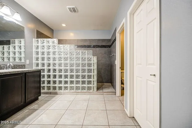 a view of empty room with windows