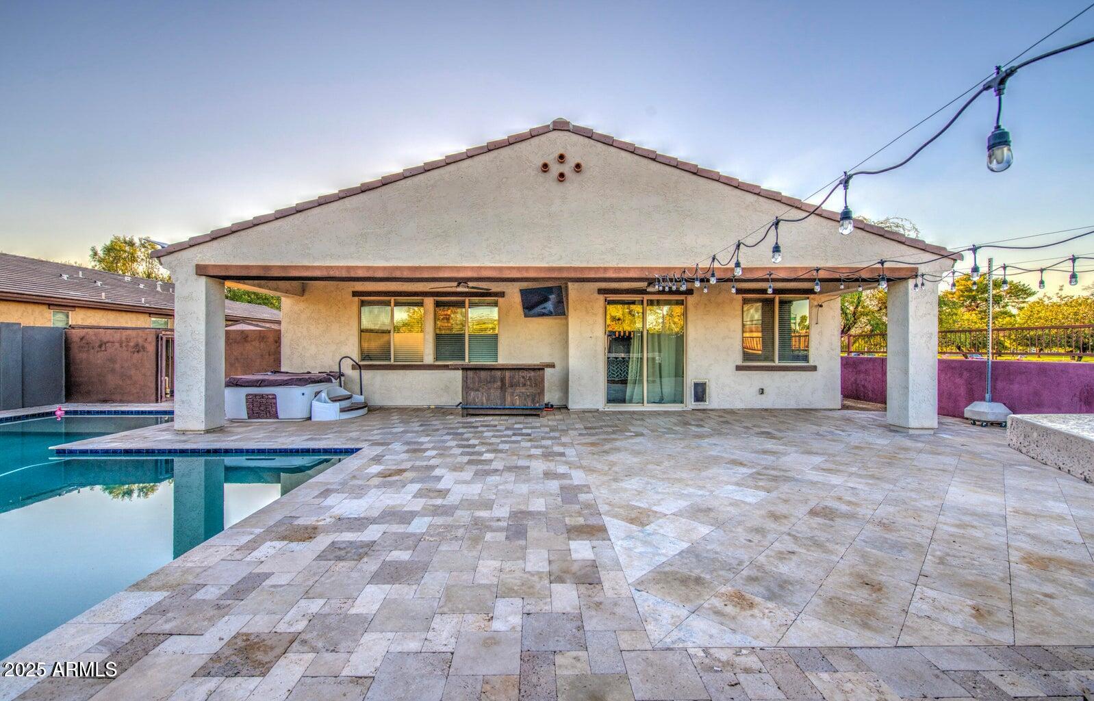 6815 South 19th Lane Phoenix, AZ 85041 - Photo 34 of 40 a view of a house with a porch