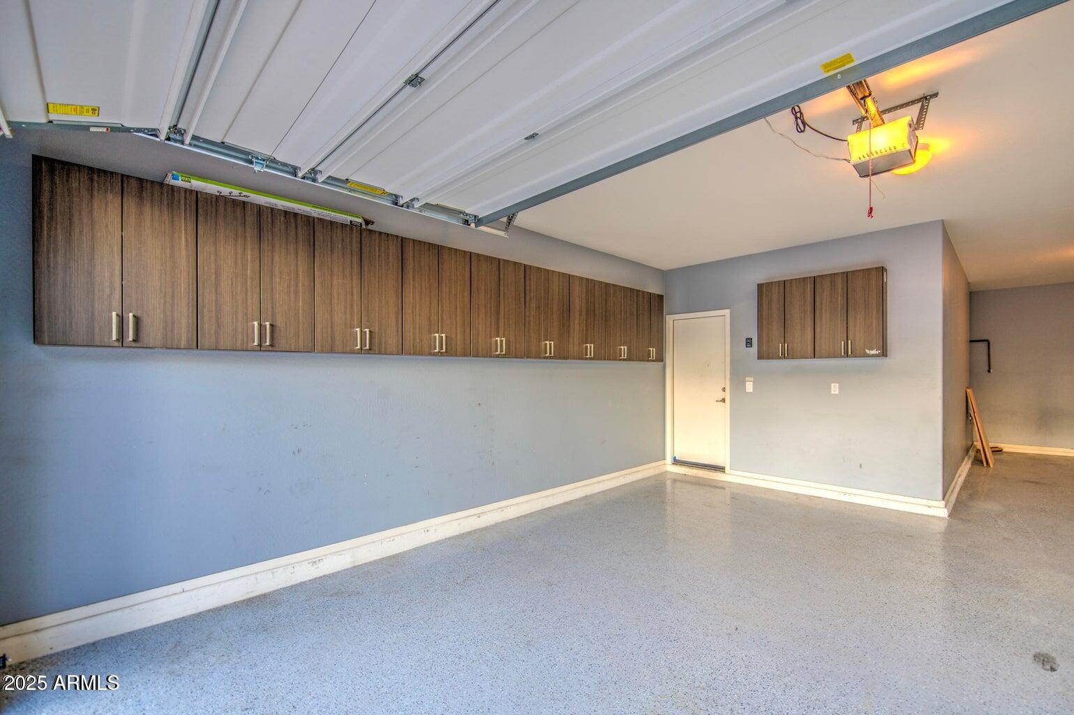 6815 South 19th Lane Phoenix, AZ 85041 - Photo 37 of 40 a view of an empty room with a window