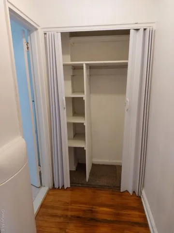 a hallway with cabinets